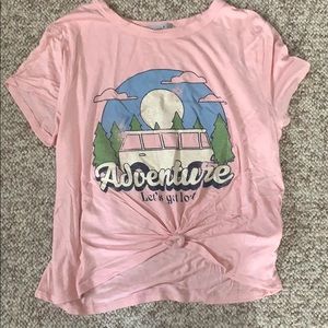 pink shirt with graphic design